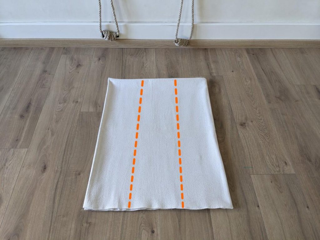Pliage de base de la couverture déplié une fois